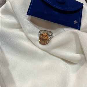 Intricate Gold and Silver Ring with Oval Gemstone